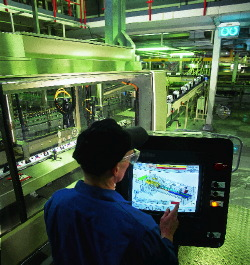 The graphical touchscreen interface allows an operator to request help and instructions on the various phases of the changeover