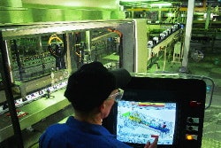 The graphical touchscreen interface allows an operator to request help and instructions on the various phases of the changeover