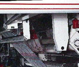 Graphic Packaging?s new 10-station press (above) operates at speeds exceeding 1,000?/min. At a laminating station near the end o