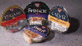 The bowl?s ?foot? not only enables the package to stand nicely in a refrigerated display, it also keeps the cheese or meat as cl