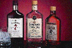 The quick-change rotary orienter (top) properly aligns three 375-ml flasks sold in two distinctive shapes (above