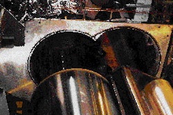 PC Materials uses vacuum chamber coating equipment in its low-temperature plasma coating process. Here the substrate is visible