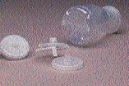 These 8-oz bottles of milk-it! brand milk in six-packs will debut in January in Orlando. Inset shows close-up of the bottle?s