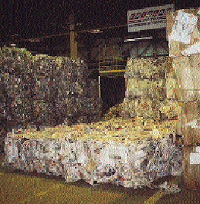 Steel-banded bales of separated recyclables are brought to this staging area prior to shipment to users of these recovered mater