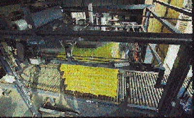 At Bandini, once a load is positioned on the turntable of the stretch wrapper (top), the top sheet is pulled out in the film fra