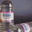Molds open (top) to reveal the injection-molded PET preforms, which are subsequently conditioned and stretch/blow molded into fi