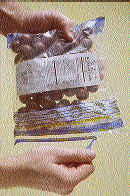 The tear strip is pulled open (left) to expose the reclosable zipper. Also visible is thepressure-sensitive label that?s manuall