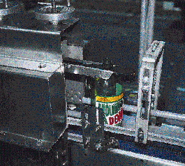 As empty bottles are depalletized (above left), they?re mutually supportive because they move forward in a mass; even more chal