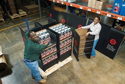 DISPLAY PREPARATION. Workers at Goodwill Industries of Southeastern Wisconsin assemble displays for Briggs & Stratton, one of th