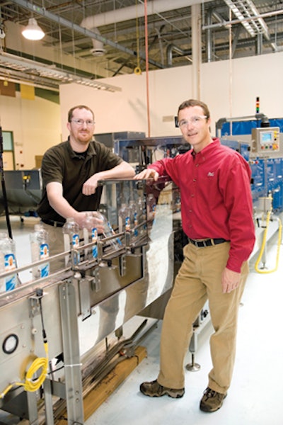 PACKML-COMPLIANT. P&G engineers Jason DeBruler (left) and Dan Amundson.