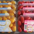 TOMATO PEARLS. Both red and yellow cherry tomatoes from Del Campo are packed in clamshells whose labels include a unique, encryp