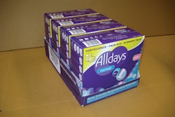 BEFORE & AFTER. Shown below left is the perforated case that came before the tray-plus-hood format above. On-shelf presentation