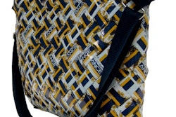 Handbag made from reused, woven Balance Bar nutrition bars.