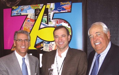 Joe Angel (left), VP/publisher, and Lloyd Ferguson (right), president, Summit Publishing Co., present Weber Marking Systems' pre
