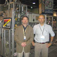 ICA's Gregg Pascoe and Dr. Giulio Evangelisti at the SCAA conference with the high performance CSV40 Paket bagging systems sold