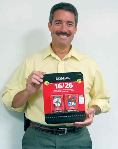 COSTCO MADE. Scott Carnie, general manager of Costco's East Coast packaging facility, shows off the company's Lexmark package th