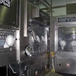 ISOLATOR CHAMBER. Sterilization, rinsing, filling, and capping are all conducted inside this microbiological isolator chamber.
