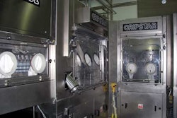 ISOLATOR CHAMBER. Sterilization, rinsing, filling, and capping are all conducted inside this microbiological isolator chamber.