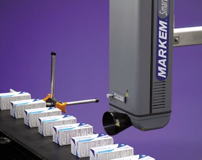 Laser coder. A laser coder marks a carton containing a solid-dose pharmaceutical product.