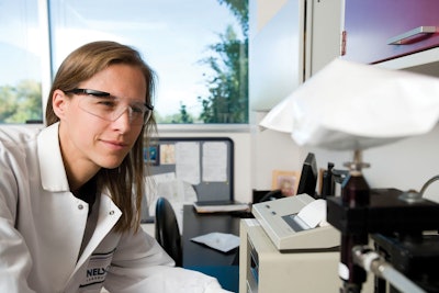 BURST TEST. A Nelson Labs study director performs a burst test.