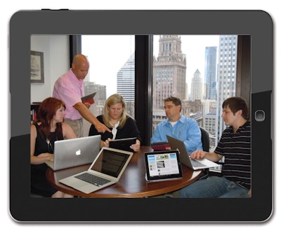 The app team. Summit Media Group's app development team in action. From left: Jen Babiarz, Dave Newcorn, Claudia Smith, Grant G