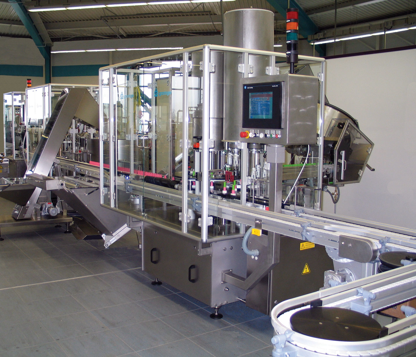 Line for mascara bottles that uses the Remote Video Service.