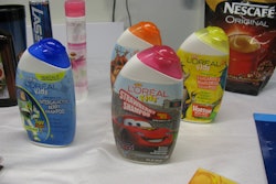 Digitally printed shrink sleeve labels on L'Oreal bottles.