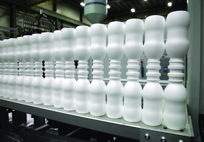 Liquid yogurt containers are extrusion blown neck-to-neck.