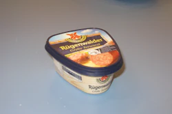 One in-mold label is applied to sidewalls and one to bottom.