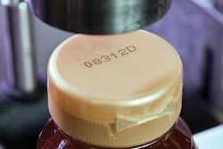 Small-character continuous ink-jet printers apply clear, crisp ID/tracking codes to the honey containers.