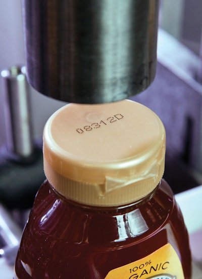 Small-character continuous ink-jet printers apply clear, crisp ID/tracking codes to the honey containers.