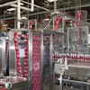 Both heads of the tandem shrink-sleeve labeler have a film accumulation feature that makes it possible to splice in a new roll of film with no interruption to labeling.