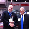 Aagard's Steve Mulder receives an award from Packaging World publisher Joe Angel.
