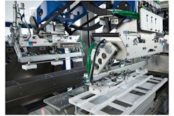 Top loading machine places blisters online.