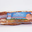 The key to the Oven Perfect film specifications is that the thermoform plus lid stock become the best possible cooking vessel for the meat cut inside.