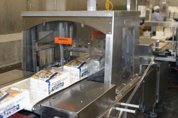 Williams-Sausage breakfast-sandwiches-moving-through-the-shrink-wrapper
