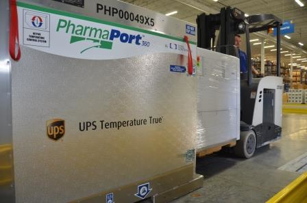 This photo shows a combination of a PharmaPort 360TM controlled temperature container and UPS Temperature True&circledR; services helped protect this vaccine shipment to Laos.