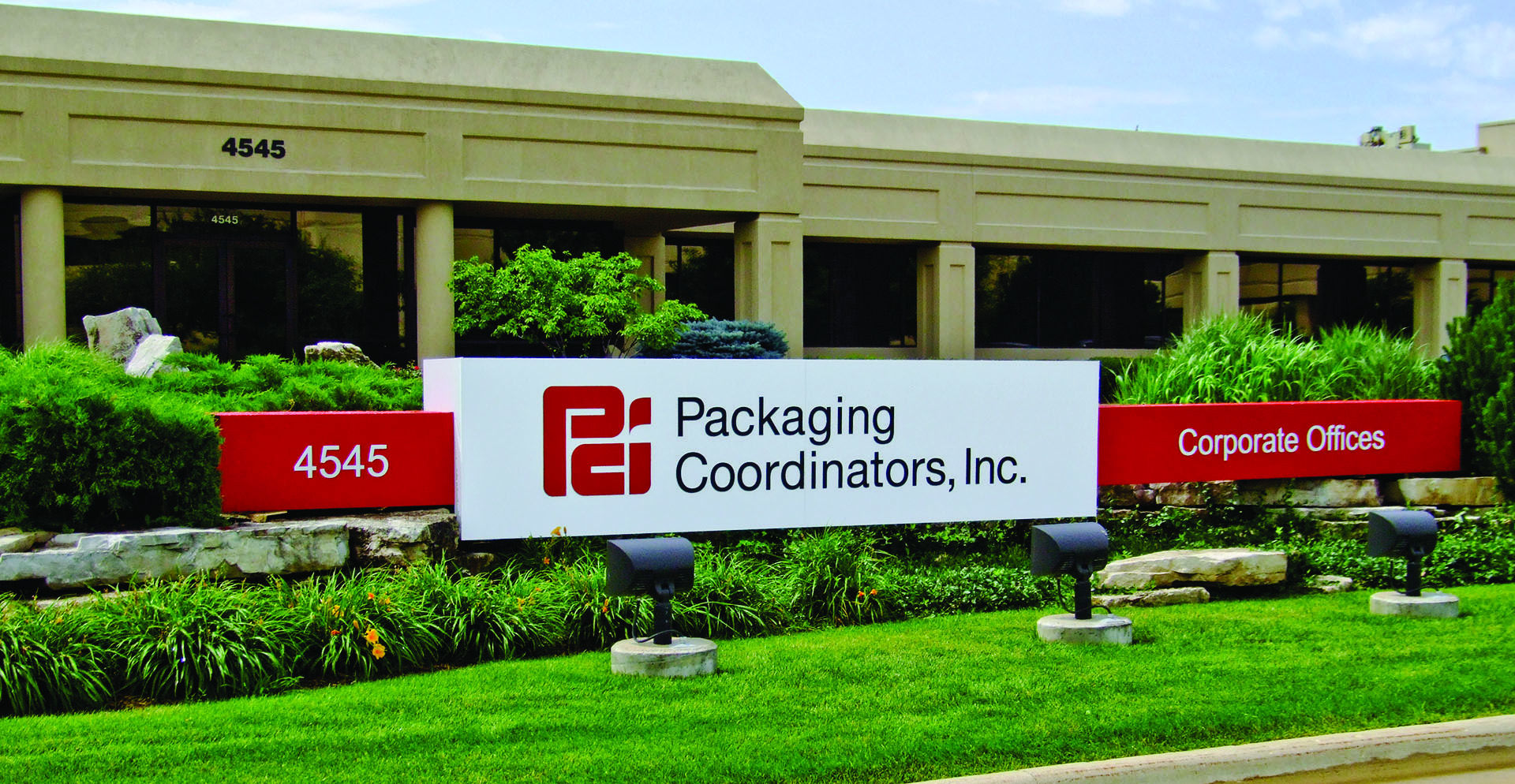 This photo shows the new Packaging Coordinators, Inc. signage at the company's Rockford, IL, facility.