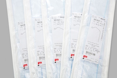 This photo shows five packs of Cook Medical products.
