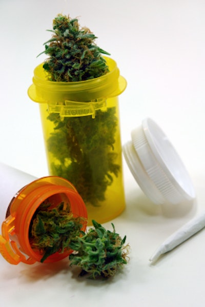 This photo shows a stock image portraying packaged medical marijuana.