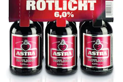 TOP-CLIP. Carlsberg’s Astra brand uses a top-clip paperboard ‘carton’ to package its six packs.