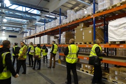 Cool Chain attendees view the ambient storage area in Luxair Cargo’s new Pharma & Healthcare Hub. The facility can accommodate 1,270 Euro pallets of 15°C to 25°C product.