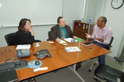 An update on the U.S. Pharmacopeial Convention in Rockville, MD. In this photo, Theresa Laranang-Mutlu (far left) and Dr. Desmond Hunt (far right) of the U.S. Pharmacopeial Convention talk with Healthcare Packaging Editor Jim Butschli.