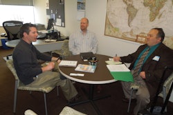 From left to right, Zachary Brousseau and Matthew A. Clark of the Regulatory Affairs Professional Society speak with Jim Butschli, Healthcare Packaging Editor.
