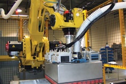 Successful suction. The programmable dense-cup-population tooling uses a total of 128 vacuum cups to pick freshly baked buns and other products from primary packaging lines to bread trays