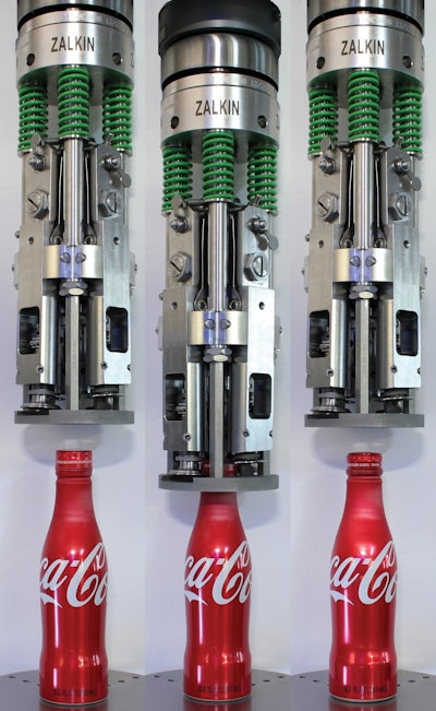 DOUBLE ACTING. Using tooling like this, the 20-head capping system now running in Truesdale, MO, pushes the aluminum capsule down onto the top of the bottle and also gently rolls on the cap, in the process forming the cap threads and tamper-evident band.