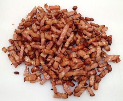 Bacon is basted and cooked in its own juices in a spiral oven, providing the appearance of a pan-fried product. Source: Unitherm