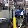 ALL-ELECTRIC. Shown here is one of the seven all-electric hot melt adhesive application systems running at the PepsiCo plant.