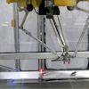 ESS TaskMate with Fanuc M-1iA Robot provides automatic blister loading for Starview Packaging Machinery.