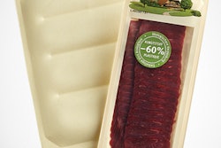 THERMOFORMABLE PAPER-BASED TRAY. Shown here are two of the seven varieties of chilled meat products packaged by Micarna in the PaperLite material.